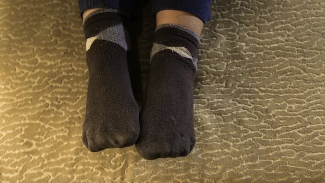 Dress socks on baby's feet