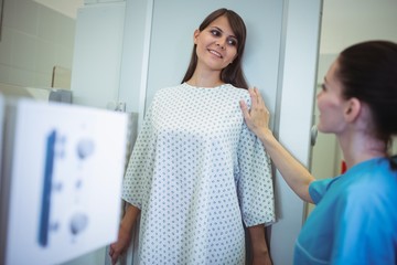 Female patient undergoing an x-ray test