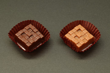 decorated chocolate on black background