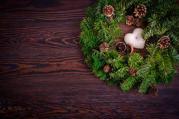 Warm winter composition with a candle / background