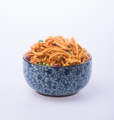 murukku or traditional indian snack on background.