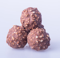 chocolate ball or chocolate bonbon on a background.