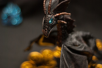 black leather Dragon Figure with gold coins