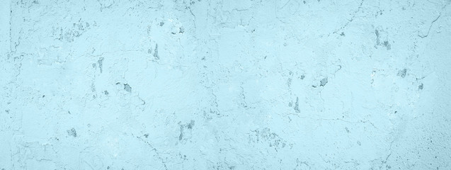 Blue abstract textured background cracked plaster. Texture of blue paint cracked wall. Background Plaster Wall Texture Blue Blue