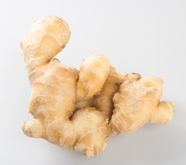Ginger or fresh ginger on a background.