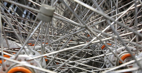 detail of thousands of spokes of the bicycle wheel