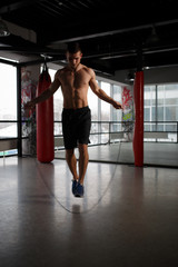 Obraz premium Portrait of athlete with rope