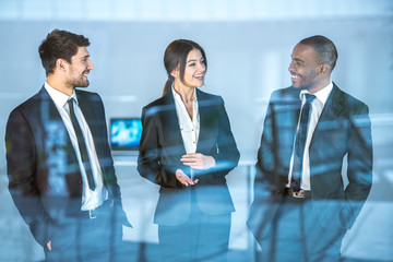 The smile business people stand over the window