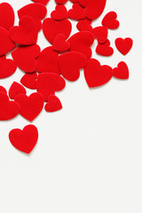 Red hearts scattered on a white background.