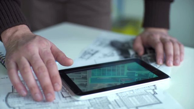 Engineer working in design office on desktop computer