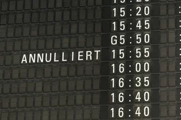 Papier Peint photo Aéroport german airport departure board canceled information