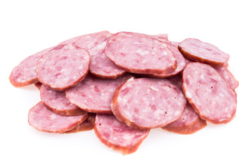 Slices of salami sausages isolated on a white background.