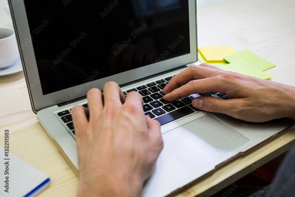 Aufkleber graphic designer using digital tablet at his desk