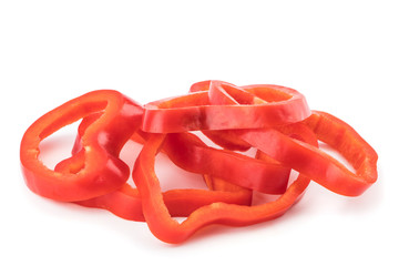 sweet peppers sliced in pieces on white background.