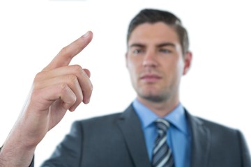 Businessman touching an digital screen