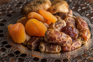 Plate of dates and dried fruits