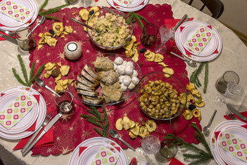 family having lunch at home, top view of the table with food