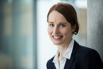 Smiling businesswoman in office