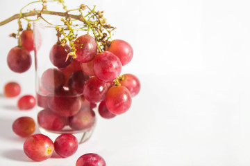 Red grape on glass