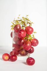 Red grape on glass