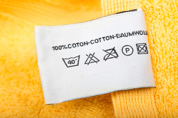 Clothing label with laundry care instructions
