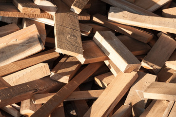 Pile of wood logs for build Furniture production,sew natural wood scraps, ready to recycle and...