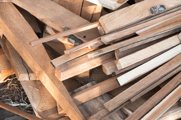 Pile of wood logs for build Furniture production,sew natural wood scraps, ready to recycle and reuse process in improved waste management under efficient sustainable approach to save environment