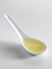 spoon of oil
