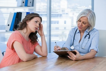 Doctor interacting with patient