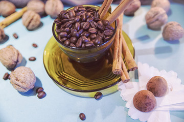 coffee beans, cinnamon, walnut, coffee cup, chocolate candy