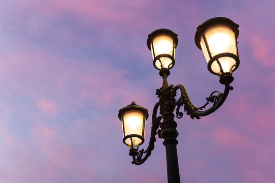 Lamp post with twilight sky.