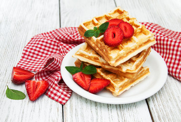 belgian waffles with strawberries and mint
