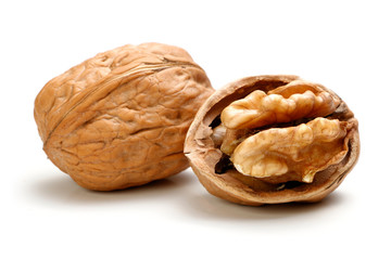 Whole walnut and half walnut piece.