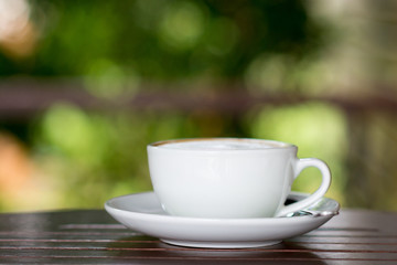 Coffee cup with bokeh background