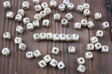 Respekt - mit Würfeln gelegtes Wort - german word for respect