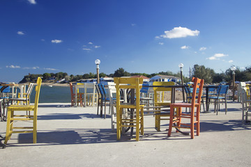 beach colored chairs on the beach