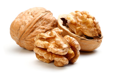Whole walnut and half walnut piece.