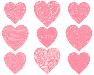 Set of pink hearts with hand drawn lines, swirls and flower elements