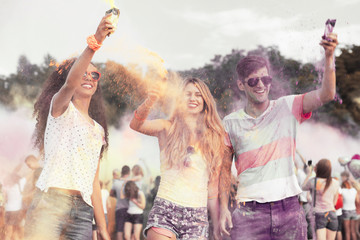Happy friends during color festival