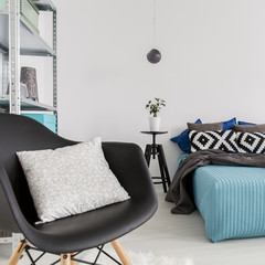 Armchair in modern minimalist bedroom
