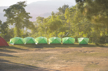 Camping tent with nature mountain landscapes background. Travel in winter season