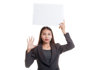 Young Asian business woman  surprise with  white blank sign.