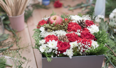 beautiful flowers box on wood table