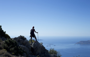 Obraz premium Young mountaineer on a mountain trip