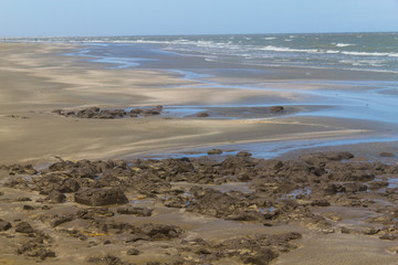 Mod, sand and waves in Cassino beach