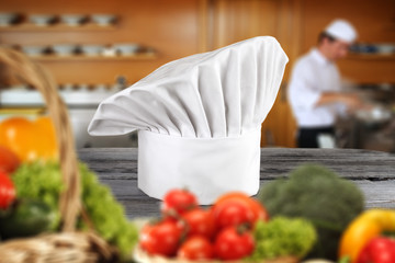 cook hat and vegetables 