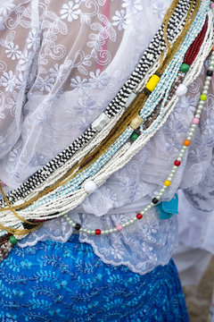 Close-up of the beads of a worshipper at the Festival of Yemanja, in Salvador, Brazil 