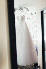 Morning of the bride. The standing at the window