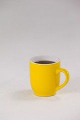 Yellow coffee cup