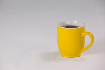 Yellow coffee cup